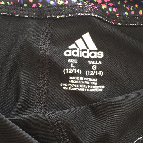 Black adidas pants, with colourful bottom pattern - Picture 3 of 4